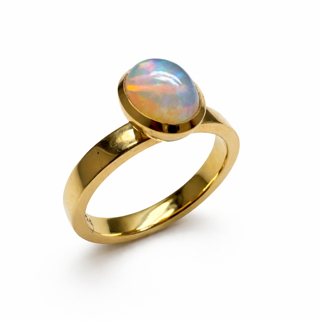 Ring mit Opal 0,94 ct aus 18 Karat Gelbgold