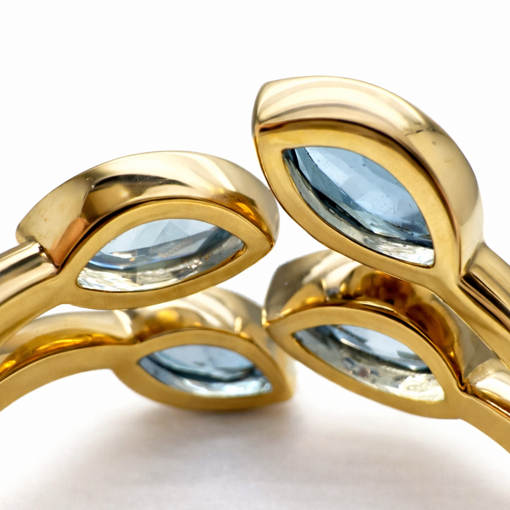 Ring mit Aquamarin und Topas in 18 Karat Gelbgold