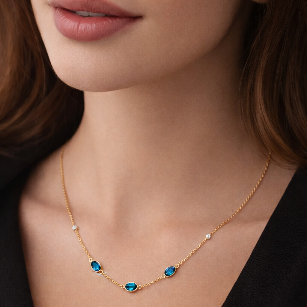 Collier mit Topas Londonblue 1,80 ct. und Brillanten 0,07 ct. aus 14 Karat Gelbgold