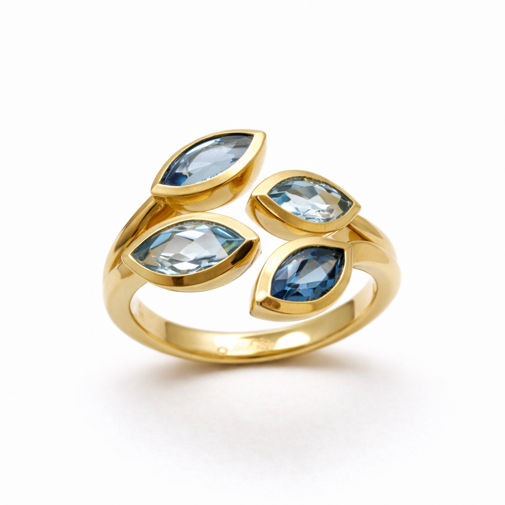 Ring mit Aquamarin und Topas in 18 Karat Gelbgold
