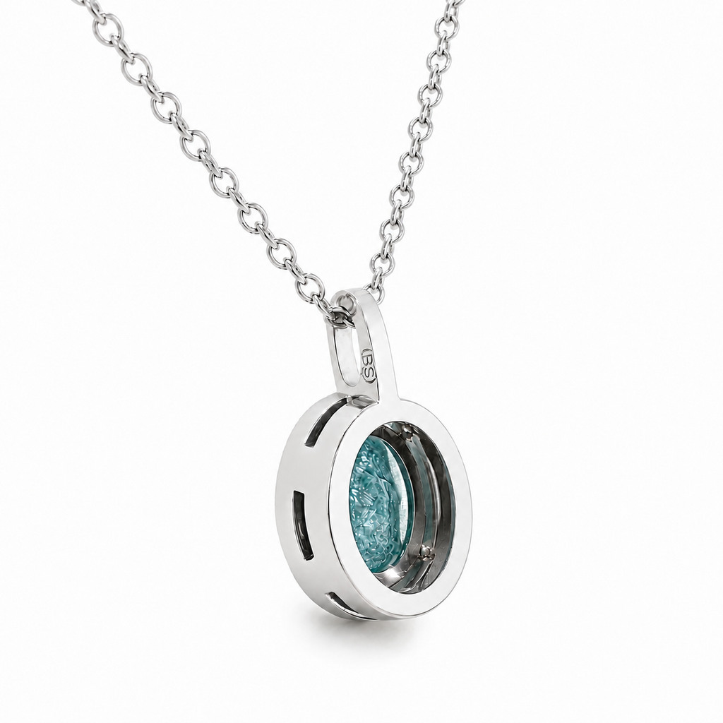 Anhänger mit Paraiba Turmalin 1,65 ct. und Brillanten 0,12 ct. in 18 Karat Weissgold