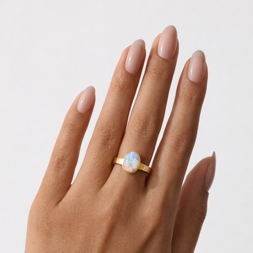 Ring mit Opal 0,94 ct aus 18 Karat Gelbgold