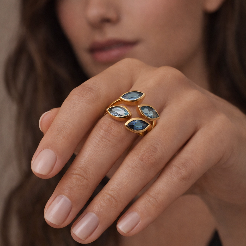 Ring mit Aquamarin und Topas in 18 Karat Gelbgold